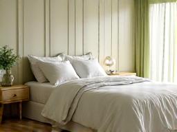 A serene bedroom with soft light, symbolizing restful sleep and recovery.